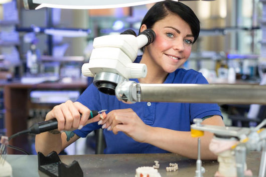 Dental Technician Producing Prosthesis