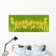 Bright yellow daffodils on a green background. Wall Mural