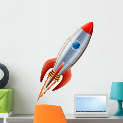 Flying Red Rocket Wall Decal shown on a wall