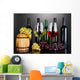 Assortment of wine in glasses and bottles on grey background Wall Mural