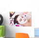 getting facial mask Wall Mural
