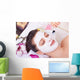 getting facial mask Wall Mural