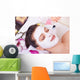 getting facial mask Wall Mural
