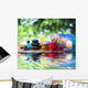 stones, candle camellia oil salt towel on water Wall Mural