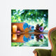 two candles and towels black stones and purple daisy on water Wall Mural