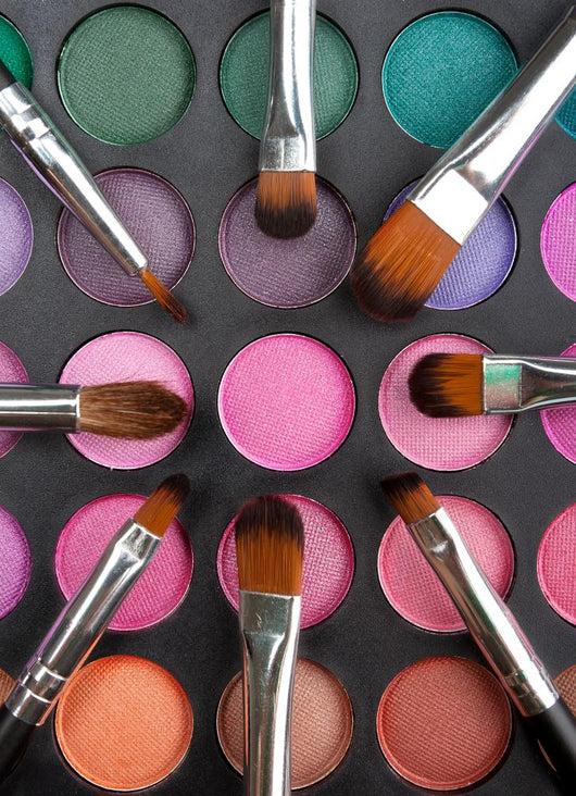 Makeup brushes and shadows Wall Mural