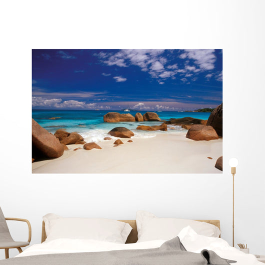 boulders in the sand Wall Mural