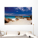 boulders in the sand Wall Mural