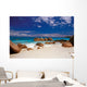 boulders in the sand Wall Mural