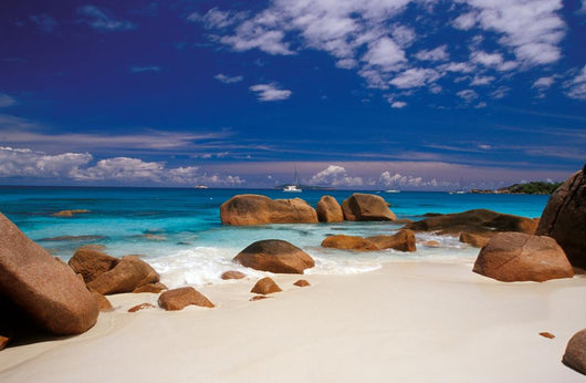 boulders in the sand Wall Mural