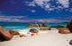 boulders in the sand Wall Mural