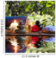 candles, towels, stones and almond flowers in water Wall Mural