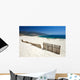 Fence Sticking Out of Sandy Beach Dunes Wall Mural