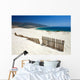Fence Sticking Out of Sandy Beach Dunes Wall Mural