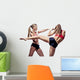 Two attractive athletic girls fighting Wall Decal