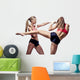 Two attractive athletic girls fighting Wall Decal