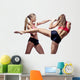 Two attractive athletic girls fighting Wall Decal