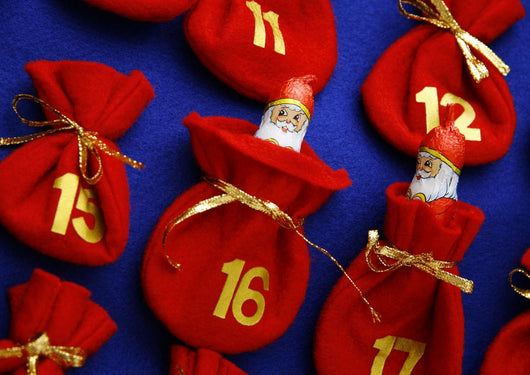 Focused on Santa Claus in Advent calendar Wall Mural