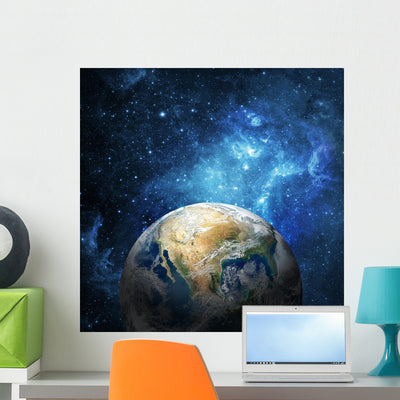 Earth and Galaxy shown on a wall