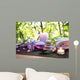 massage in the bamboo garden with violet flowers, candles Wall Mural