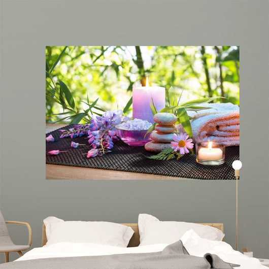 massage in the bamboo garden with violet flowers, candles Wall Mural