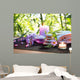 massage in the bamboo garden with violet flowers, candles Wall Mural