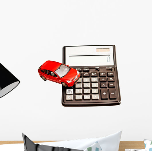 Toy car and calculator over white Wall Decal