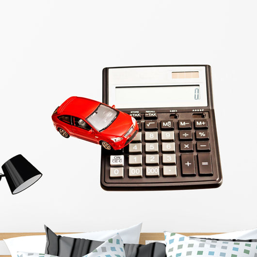 Toy car and calculator over white Wall Decal