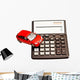 Toy car and calculator over white Wall Decal