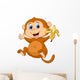 Cute monkey eating banana Wall Decal