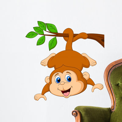 Cute Monkey Hanging Tree Wall Decal shown on a wall