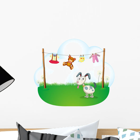 A Puppy near the Hanging Baby Clothes Wall Decal
