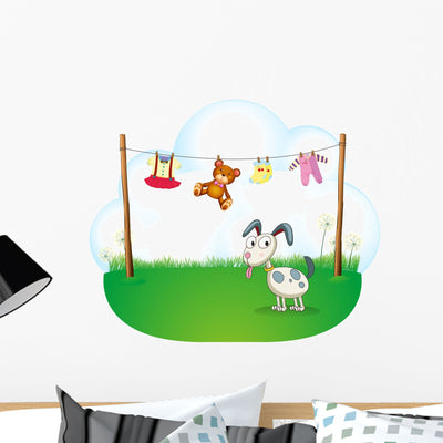 Puppy near Hanging Baby Wall Decal shown on a wall