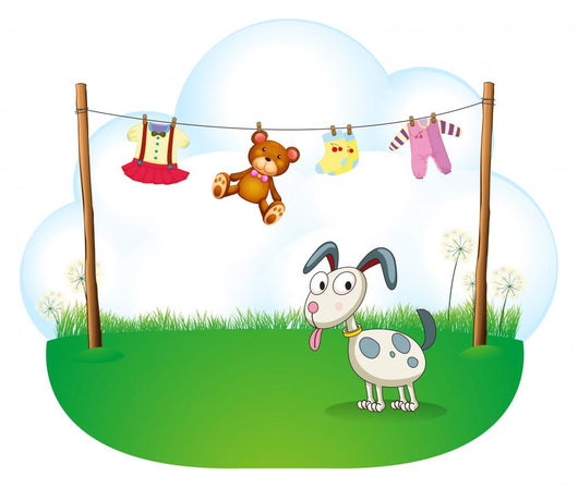 A Puppy near the Hanging Baby Clothes Wall Decal