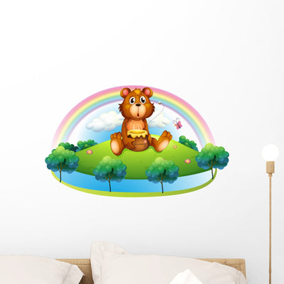 Bear Holding Pot Honey Wall Decal shown on a wall