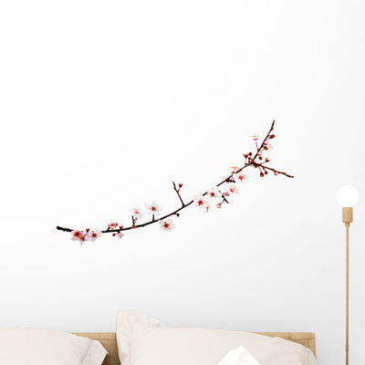 Cherry Blossoms Branch Wall Decal shown on a wall
