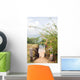 stairway entry to sandy beach  flowers Caribbean Sea Little Corn Wall Mural