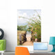 stairway entry to sandy beach  flowers Caribbean Sea Little Corn Wall Mural