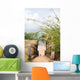 stairway entry to sandy beach  flowers Caribbean Sea Little Corn Wall Mural