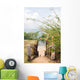 stairway entry to sandy beach  flowers Caribbean Sea Little Corn Wall Mural