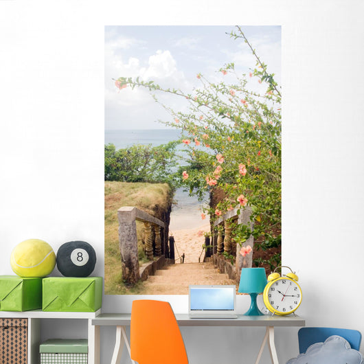 stairway entry to sandy beach  flowers Caribbean Sea Little Corn Wall Mural