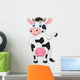 Cute cow cartoon waving hand Wall Decal