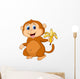 Cute Monkey Cartoon Eating Banana Wall Decal