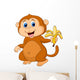 Cute Monkey Cartoon Eating Banana Wall Decal