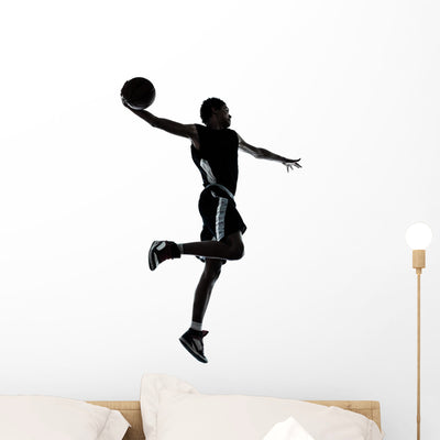 Basketball Player Silhouette shown on a wall