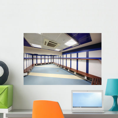 Locker Room Stadium Wall Mural shown on a wall