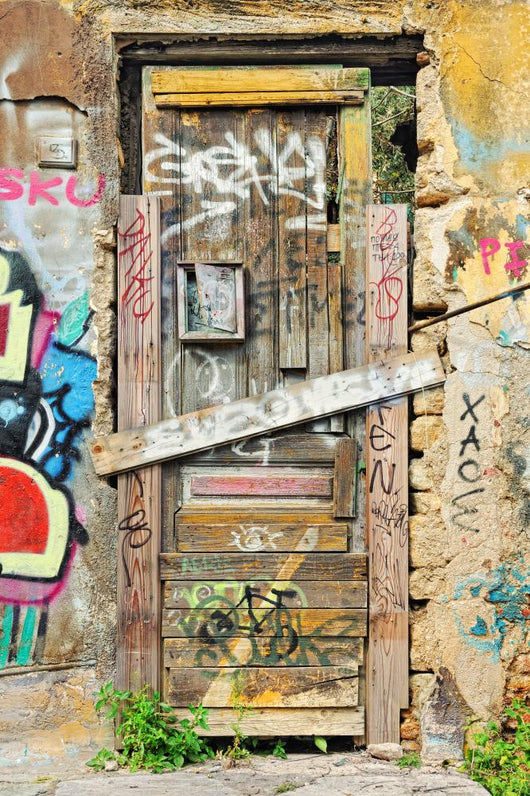 Weathered Barricaded Door and