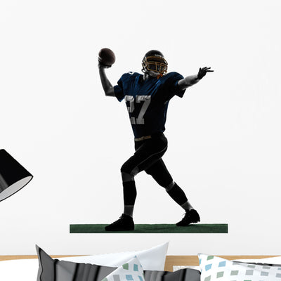 Quarterback American Throwing Football Wall Mural shown on a wall