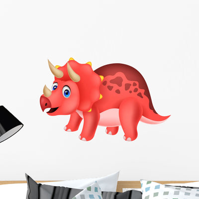 Cute Dinosaur Cartoon Wall Decal shown on a wall