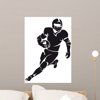 American Football Player Silhouette shown on a wall
